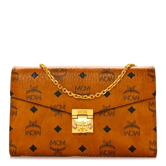 This is an authentic MCM Visetos Millie Wallet On Chain in Cognac. - Picture 1 of 5